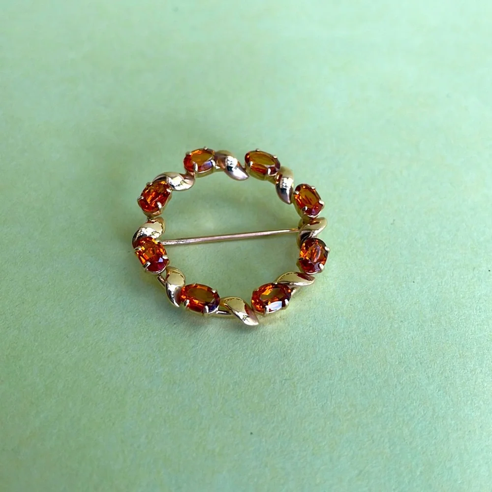Antique 14k gold brooch with genuine orange/brown  stones